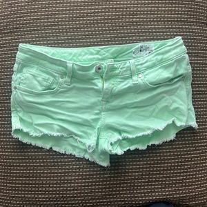 EUC fox outshine denim shorts size 3/26 lime green